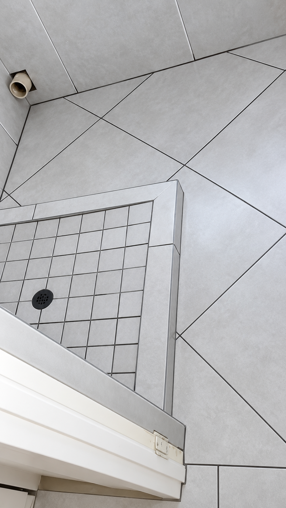Bathroom tiling project by Jackenet Building and Projects